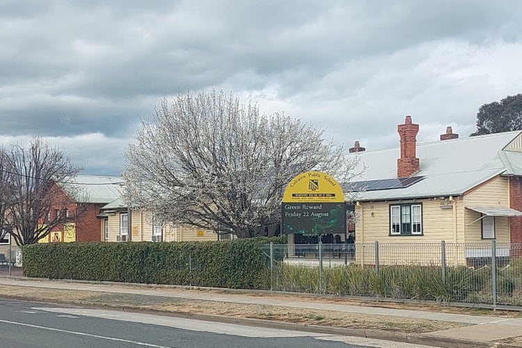 A graphic of the front of the school